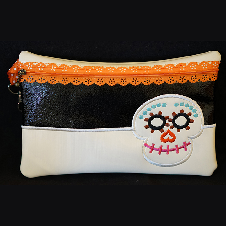 Skeleton Face with ribbon zipper purse